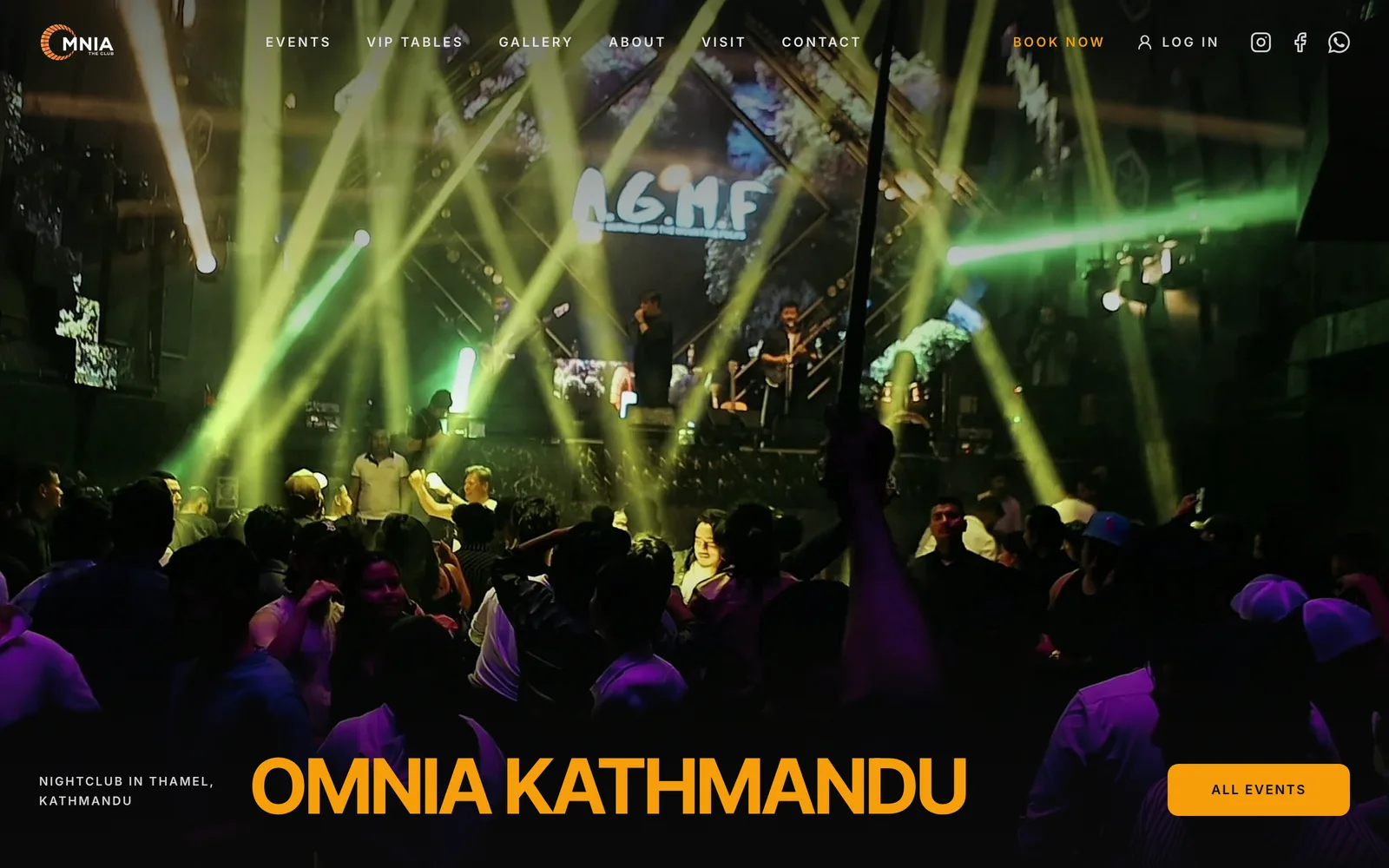 OMNIA The Club homepage hero: a packed dance floor under green and yellow beams, with the gold OMNIA KATHMANDU wordmark and an All Events button.